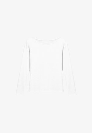 Haut à manches longues blanc en coton doux. Présente un col rond et une coupe décontractée. Design simple sans motifs ni accents.