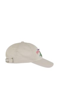 Beige színű pamutzakó, ívelt napellenzővel. Elülső oldalán hímzett színes grafika található, hátul pedig fém állítható pánt jellemzi.