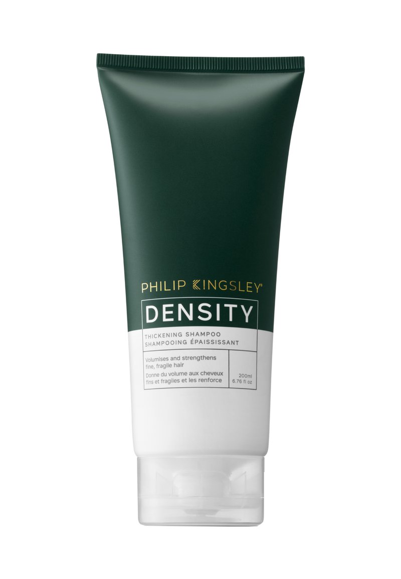 Tubo squeeze verde di shampoo addensante Density di Philip Kingsley. Presenta un'etichetta bianca con il nome del prodotto e la descrizione, capacità di 200 ml.