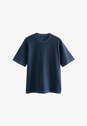 Navy blue short-sleeve T-shirt made of textured fabric, featuring a crew neckline and contrasting stitch details at sleeves and hem.