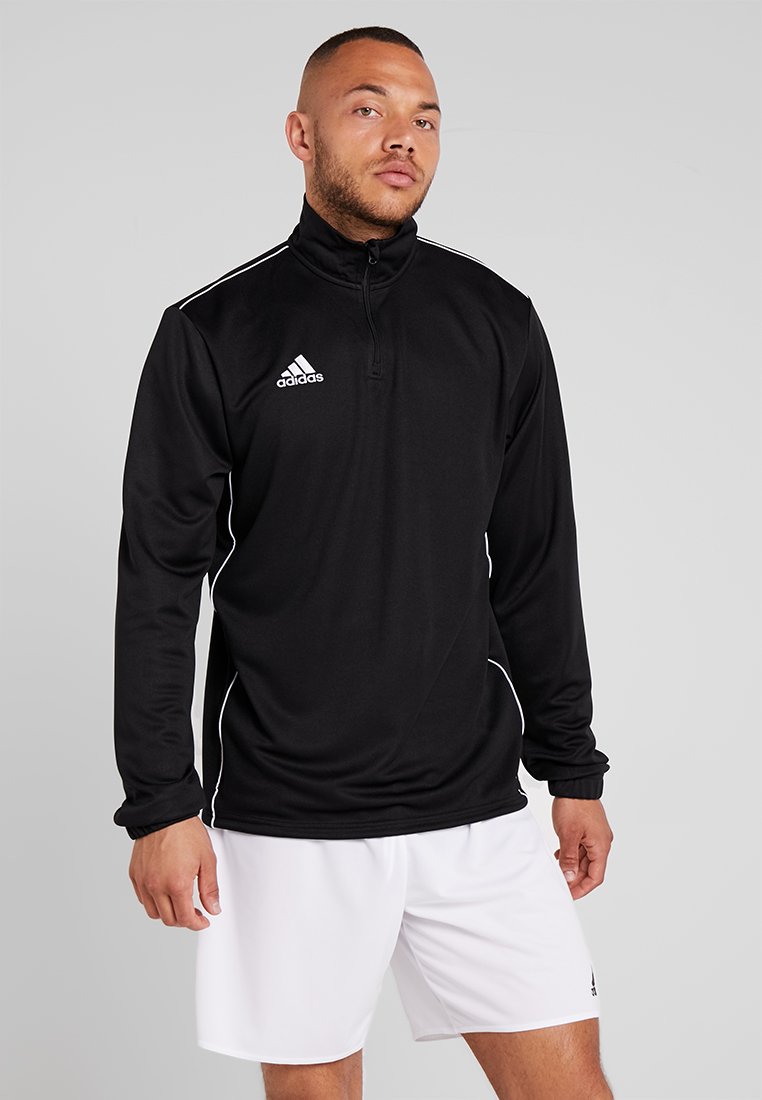 Svart idrettsgenser med høy krage, hvite detaljer, lange ermer og adidas-logo på brystet. Laget av et glatt, fleksibelt materiale.