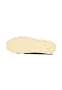 Gummisohle mit strukturiertem Muster, beige Farbe. Abgerundete Kanten und minimalistische Designdetails, geeignet für Freizeitschuhwerk.