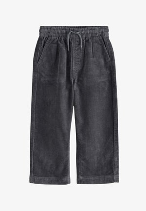 Donkergrijze corduroybroek met een losse pasvorm, voorzien van een elastische tailleband, drawstring en twee zijzakken. Gevoelige verticale strepen zijn zichtbaar.