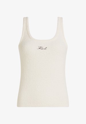 Bílý texturovaný top bez rukávů s kulatým výstřihem. Na přední straně se nachází vyšívané logo "Karl" v hnědé barvě. Vyrobeno z jemného materiálu.