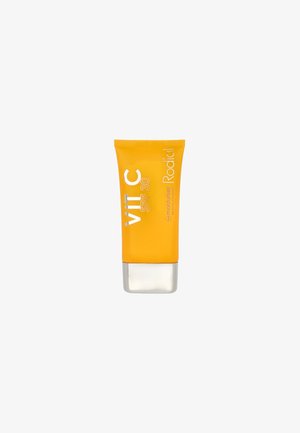Gelbe Tube der Rodial Vitamin C SPF 30 Feuchtigkeitscreme mit silberner Basis, die erhabenen weißen Text und ein mattes Finish aufweist.