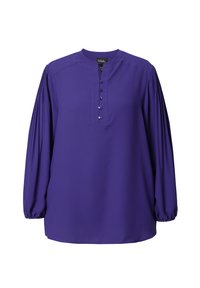 Blusa viola a maniche lunghe con scollatura rotonda, chiusura frontale con bottoni e maniche arricciate per un look voluminoso. Tessuto dalla texture liscia.