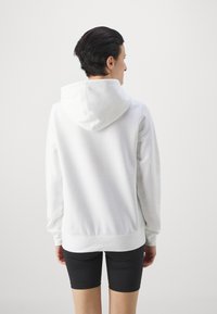 Champion GRAPHIC HOODIE - Mikina - white