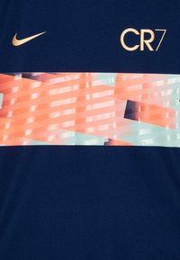 Nike Performance CR7 DF ACD23 UNISEX - Sportska majica - blue void/metallic gold