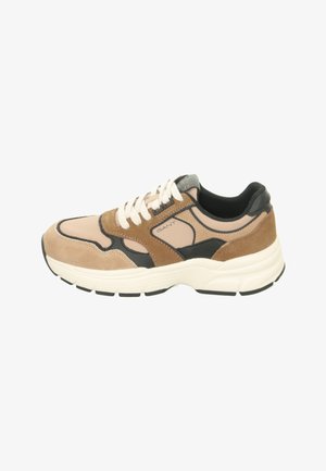 Beige and brown suede sneaker with black accents, white laces, padded collar, and thick white sole. Logo visible on the side.