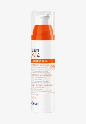 Weißer Pumpspender mit orangefarbenen Akzenten, 50 ml Fassungsvermögen. Texturierte Oberfläche, enthält mehrsprachige Produktinformationen und einen klaren Deckel.