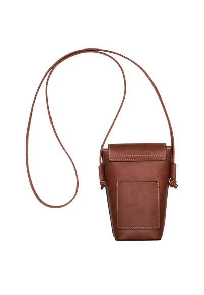 Brown textured leather crossbody bag with a flap closure, adjustable strap, and a front pocket. Features stitched accents and a sleek design.