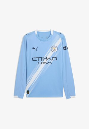 Lichtblauwe langemouwen voetbalshirt met witte diagonale streep. Bevat het zwarte Puma-logo, de tekst "ETIHAD AIRWAYS" en het teamembleem.