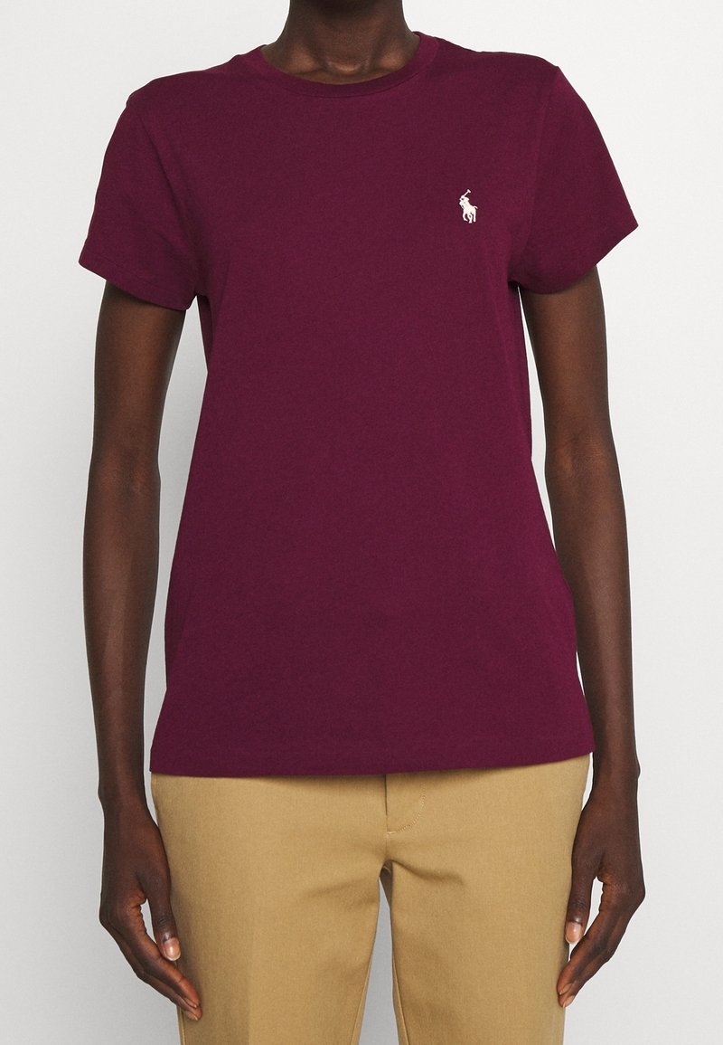 Burgundy cotton t-shirt with a crew neckline and short sleeves, featuring a small white logo on the chest.