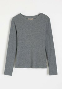 Szary długi rękaw, wykonany z miękkiej tkaniny bawełnianej. Posiada okrągły dekolt i boczne rozcięcia dla większej swobody ruchów.