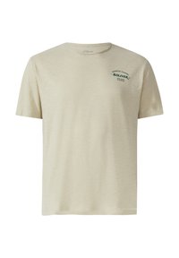 Beige T-Shirt mit kurzen Ärmeln aus weichem Stoff, rundem Halsausschnitt, lockerer Passform und einem grünen Logo-Druck auf der linken Brust.