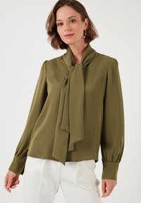 Unselected, olive green