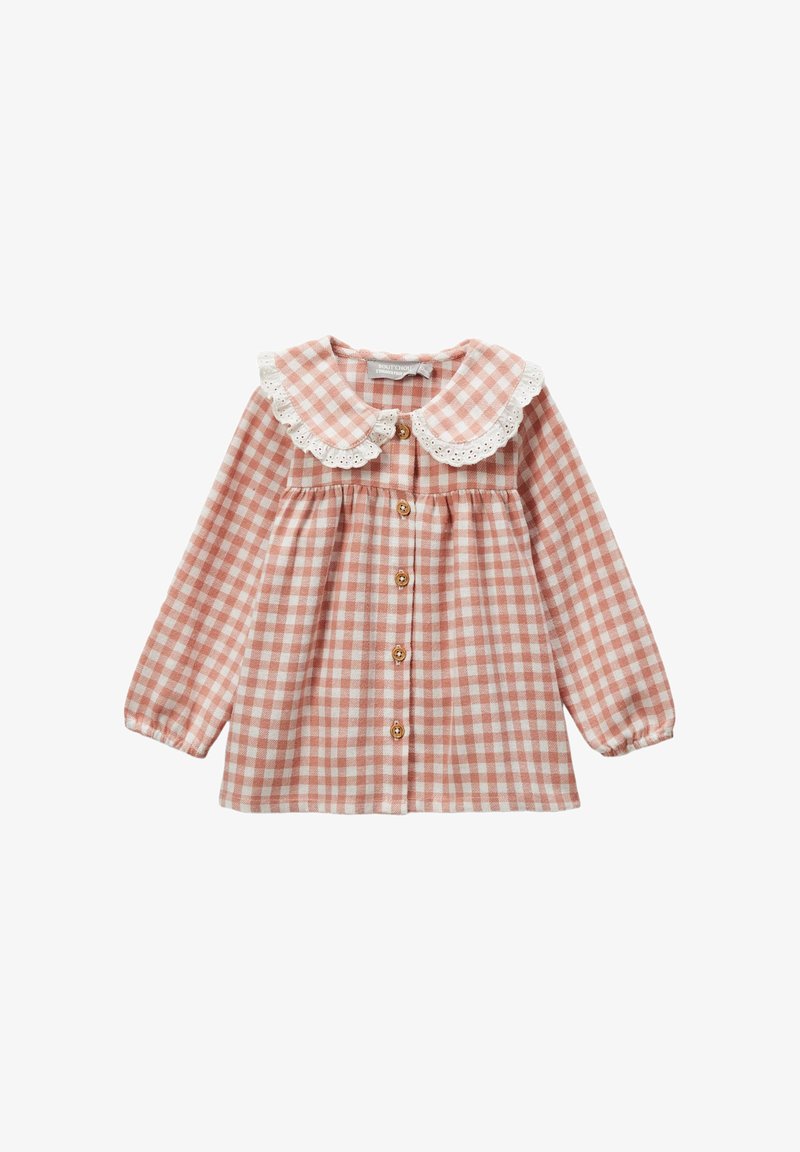 Chemise en vichy rose à manches longues, col avec dentelle, fermeture par boutons et taille froncée. Tissu doux avec un motif à carreaux.