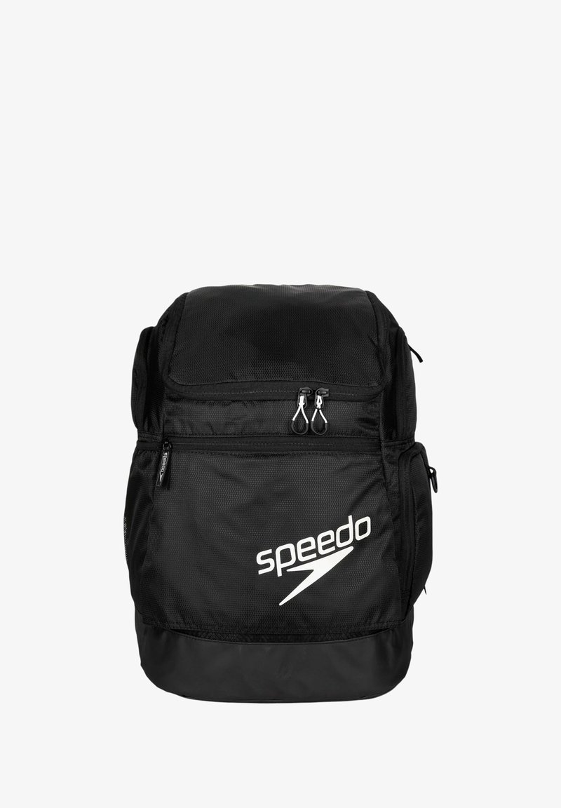 Zaino Speedo nero realizzato in nylon resistente, dotato di un ampio scomparto, tasca frontale con zip, tasche laterali in rete e dettaglio con logo.
