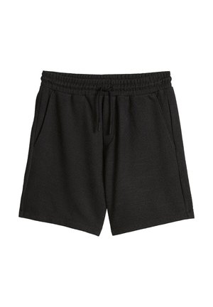 Short noir en tissu éponge avec taille élastique, cordon de serrage et poches latérales, présenté à plat sur fond blanc.