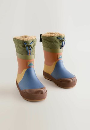 Rubber rain boots with a quilted green collar, multicolored body in blue, orange, and yellow, and a textured brown sole. Features a logo tag.