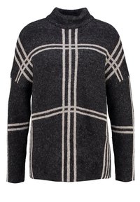 Czarny sweter z teksturowanej tkaniny, z wysokim kołnierzem, luźnym krojem oraz kremowymi pionowymi i poziomymi paskami.