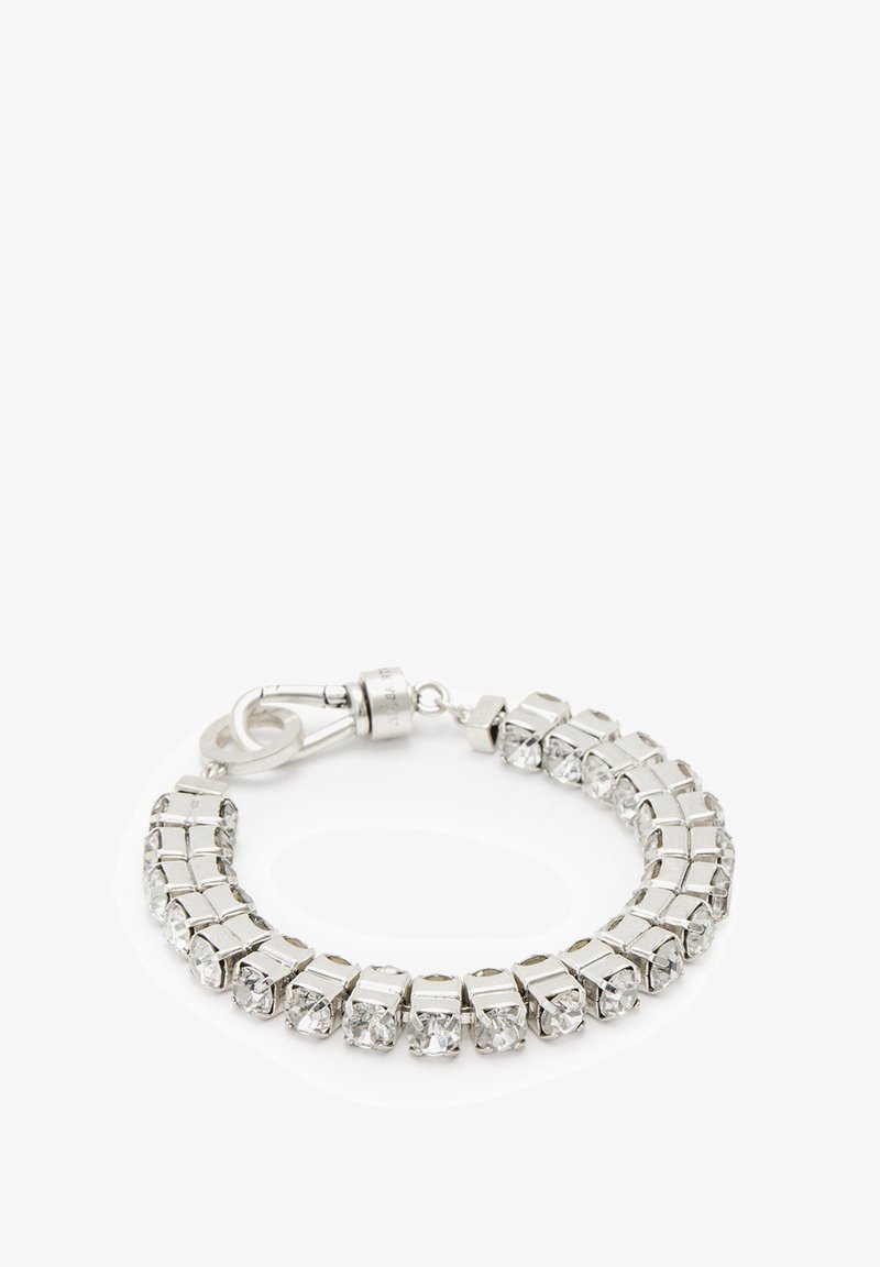 Silver bracelet featuring square silver links interspersed with clear crystals. Clasp attachment adds to design functionality.