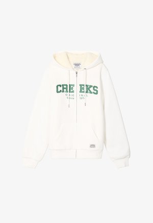 Sweat à zip blanc en tissu doux. Présente un logo vert, des poches avant et une capuche doublée. Poignets et taille côtelés.
