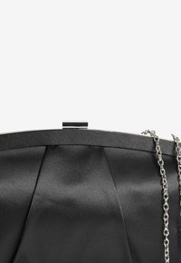 Next Clutch - black