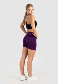 Smilodox HIGH WAIST SEAMLESS SCRUNCH PHELIA - Tights - violett