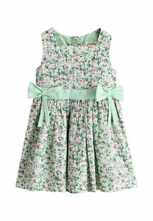 Vestido sin mangas para niño pequeño con estampado floral en verde pastel, falda fruncida y dos lazos de tela en verde menta en la cintura.