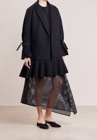 DESIGNERS REMIX Klassischer Mantel - black