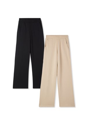 Dwie pary spodni w szerokim kroju: jedna w kolorze czarnym, a druga w beżowym. Obie mają elastyczne pasy i boczne kieszenie, wykonane z miękkiego materiału.