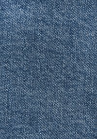 Denim fabric, medium blue tone, textured with a classic weave pattern, featuring slight variations in color. Evenly distributed stitching visible.