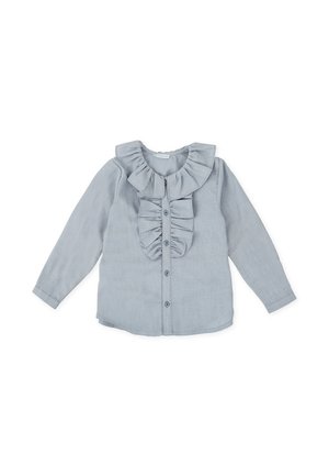 Camisa de manga larga azul claro con cuello volado y parte delantera con volantes, que presenta cierre de botones y una tela suave y texturizada.