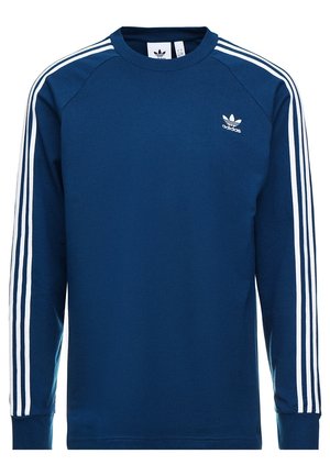T-shirt de sport Adidas à manches longues bleu marine avec trois bandes blanches sur les manches et petit logo trèfle sur la poitrine.