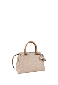 Borsa a tracolla beige con motivo e manici in pelle marrone chiaro. Presenta una chiusura con zip e un accento decorativo a volant sul lato.