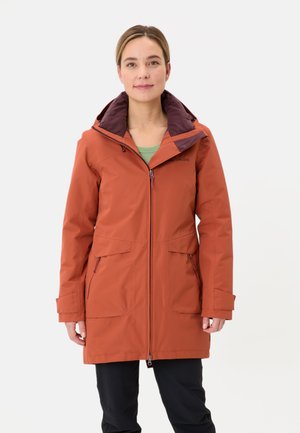 Orange waterproof jacket with a zippered front, two large front pockets, and a maroon-lined hood. Fabric has a smooth texture.