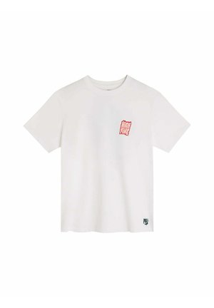 T-shirt blanc à manches courtes, col rond, présentant un petit graphique rouge sur la poitrine et un détail de logo vert sur l'ourlet.