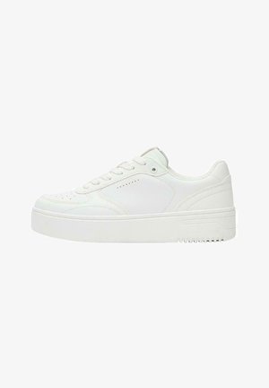 Low-top white sneaker with lace-up front, perforated details on toe and side, and thick rubber sole.