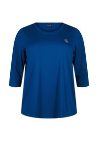 Blue long-sleeve shirt with a round neck, smooth texture, and a small graphic design on the left chest. Classic fit and casual style.