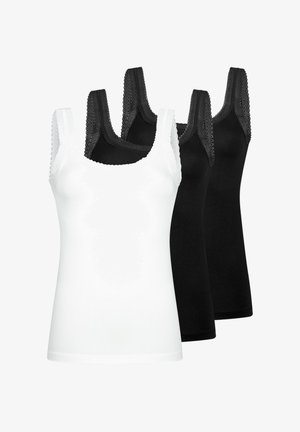 Trois débardeurs pour femmes sans manches, un blanc devant et deux noirs derrière, tous avec des bretelles larges ornées de dentelle.