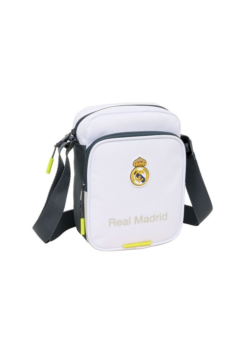 Borsa a tracolla bianca e grigia del Real Madrid con logo e spallaccio regolabile, tasca anteriore con zip e tirazip gialli.