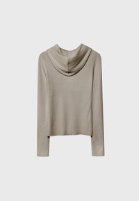 Top de manga larga con cuello cisne en tela acanalada beige claro. Presenta un ajuste relajado y longitud corta, con textura suave y lisa.