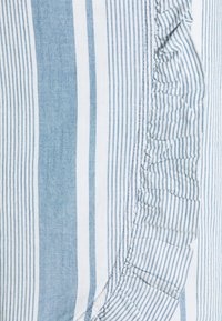Light blue and white striped fabric with a ruffled edge detail; smooth texture with evenly spaced narrow stripes throughout.