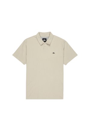 Beige polo shirt made of cotton blend. Features a collared neckline, short sleeves, and a small black logo on the left chest.