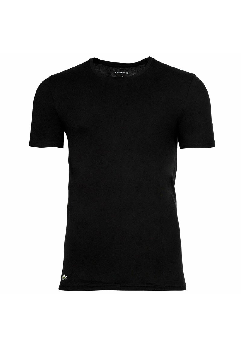 Schwarzes T-Shirt für Herren mit kurzen Ärmeln und Rundhalsausschnitt, mit kleinem grünen Krokodil-Logo in der Nähe des unteren Saums auf der linken Seite.