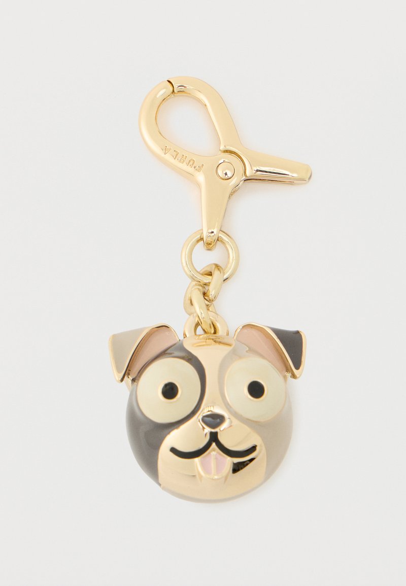 Kullattu metallinen koiran muotoinen avaimenperä, jossa on suuret silmät, musta ja ruskea kuviointi sekä irrotettava hummerilukko. Sileä pinta.