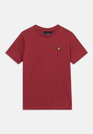Prosty czerwony T-shirt z krótkim rękawem, okrągłym dekoltem i małym żółtym logo ptaszka na lewej piersi.