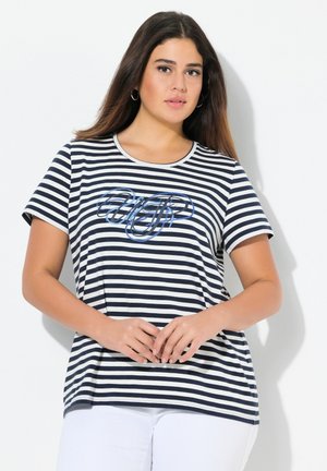 T-shirt a righe in cotone navy e crema, maniche corte, scollatura a girocollo, presenta una stampa grafica blu sul petto, vestibilità rilassata.