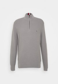 Felpa zip grigia chiara con un motivo testurizzato, polsini a costina e un colletto alto con accenti rossi e blu navy. Piccolo logo sul petto.